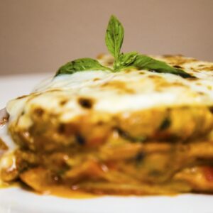Lasagna sheets baked with mozzarella, tomato, zucchini & Peppers